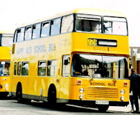 AHU518V in yellow school bus livery with Happy Al's